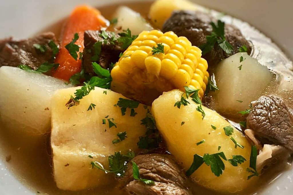 Olla de carne — slow-cooked beef and root vegetables. The taste of a Costa Rican Sunday.