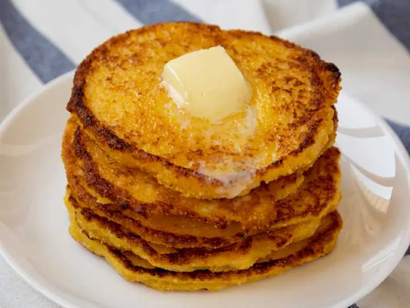 Chorreadas — corn (or yuca) pancakes with natilla and cheese. A Tico afternoon in one bite.