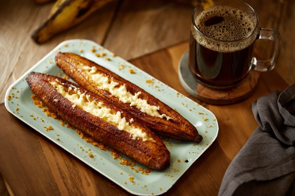 Plátanos asados con queso — sweet roasted plantain and melty cheese. Childhood on a plate.