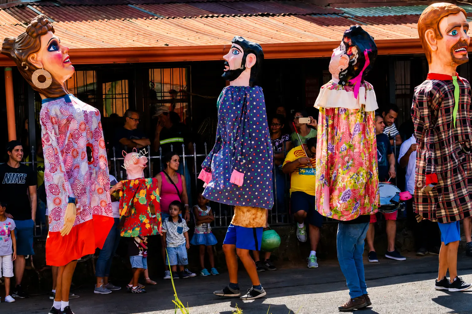Mascaradas and the cimarrona band — the part of the celebration that spills off the parade route and into the street.